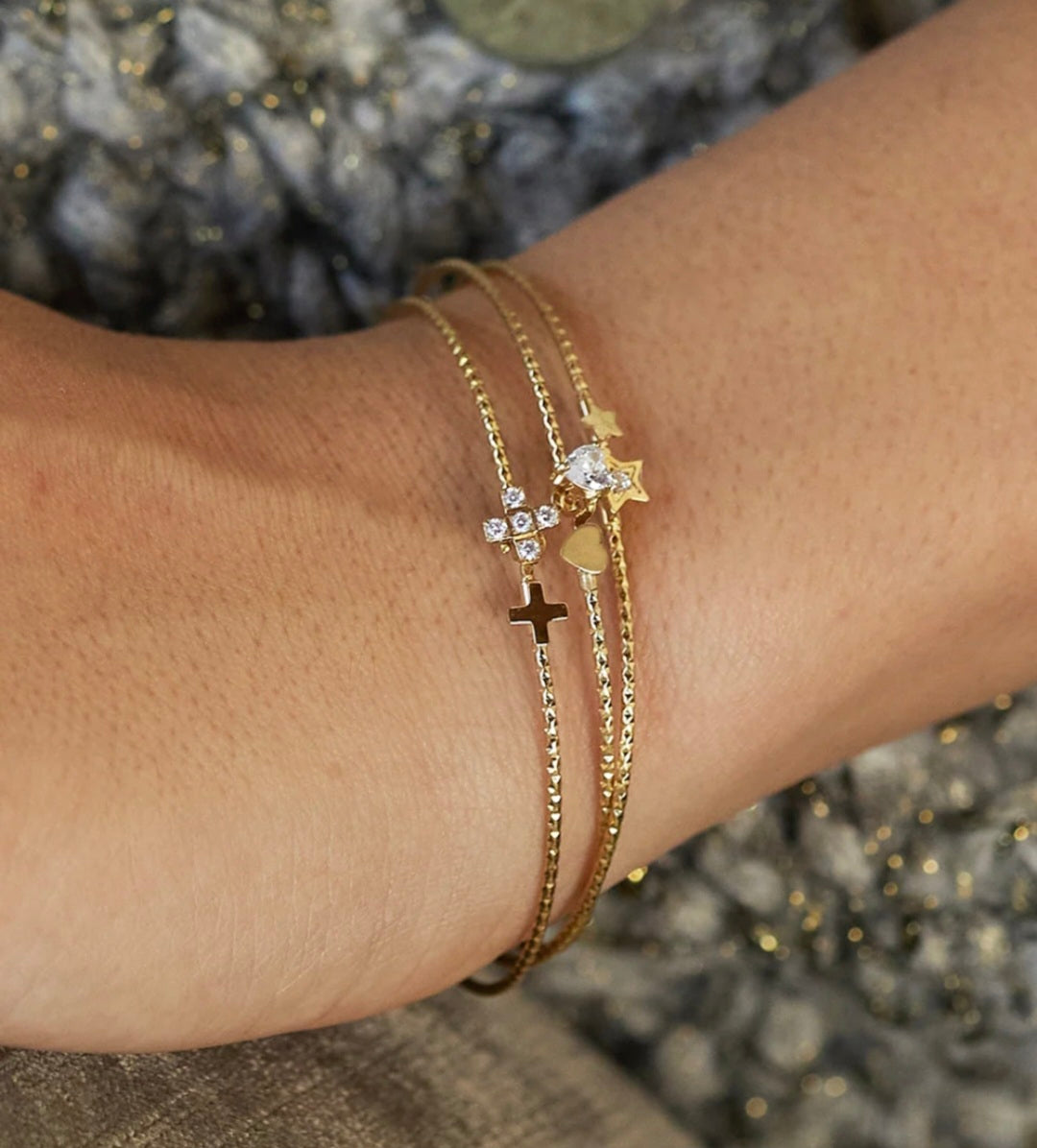 Bracciale rigido Due Cuori in acciaio dorato