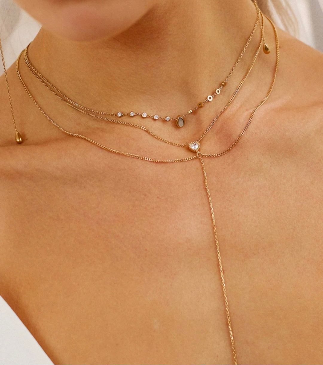 Collana doppio filo con cuore e goccia
